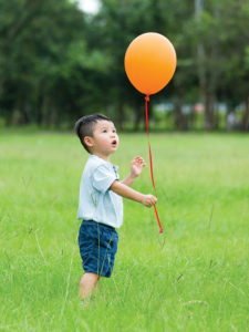 Child with balloon
