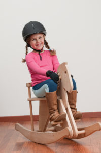 Child on rocking horse